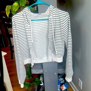 Black and white cropped zip up.